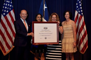 Technologent International Business Manager, Harvinder Mudahar, and VP of HR, Tammy Cooper, accept the President's "E" Award from U.S. Secretary of Commerce Wilbur Ross and Congresswoman Mimi Walters